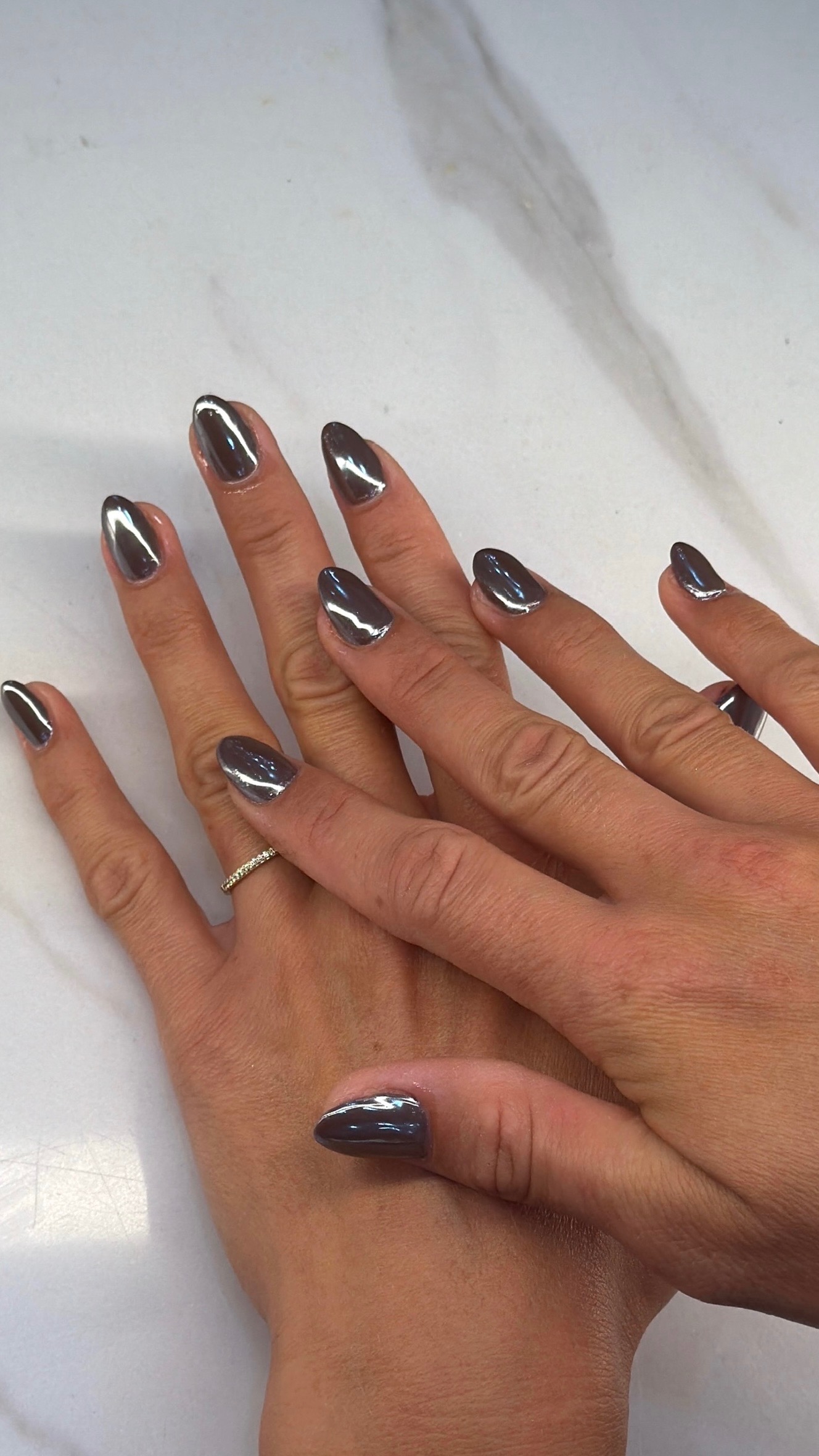 Salon brown chrome round manicure